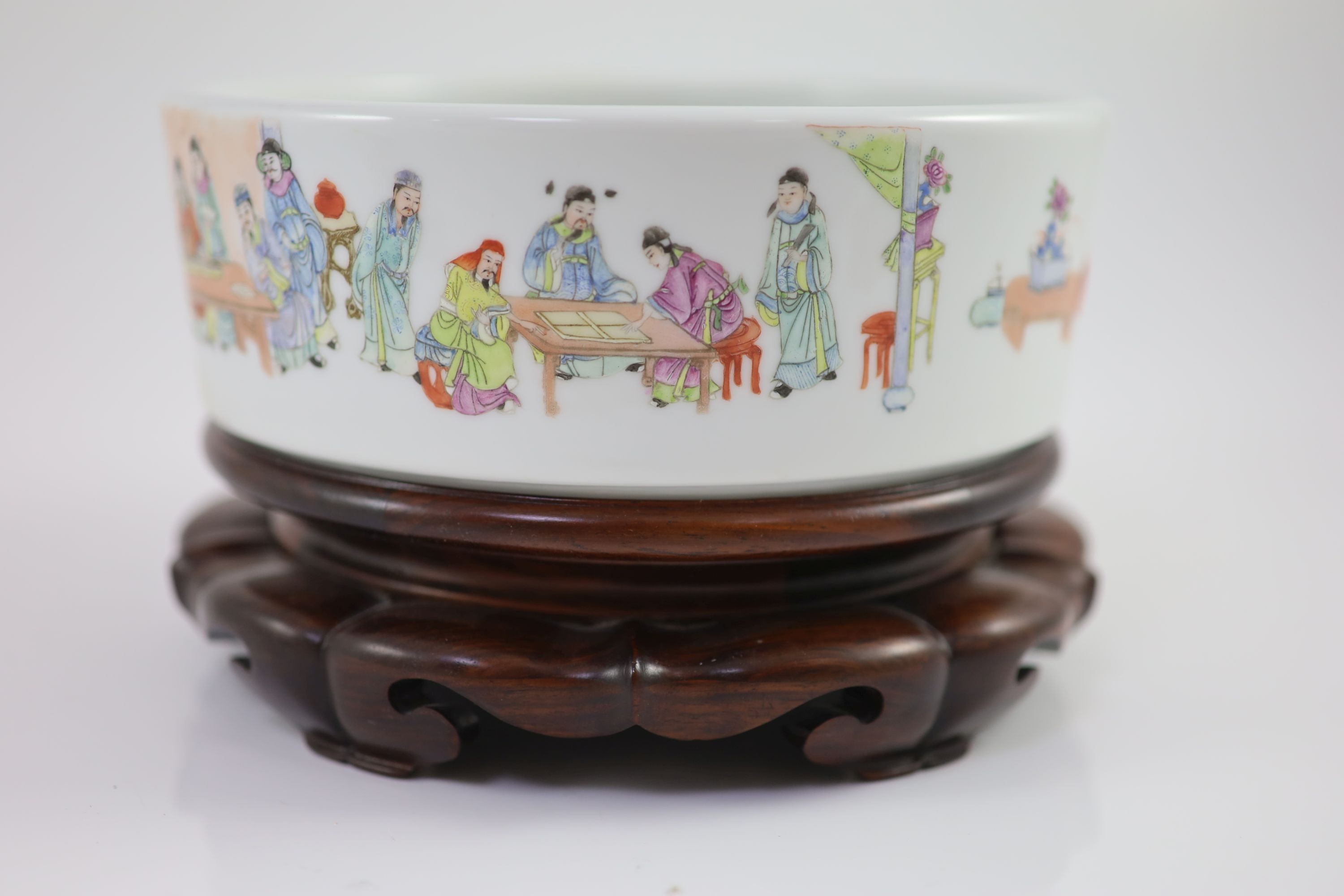 A Chinese famille rose cylindrical bowl, Yongzheng mark but Republic period, 19cm diameter, 7cm high, wood stand